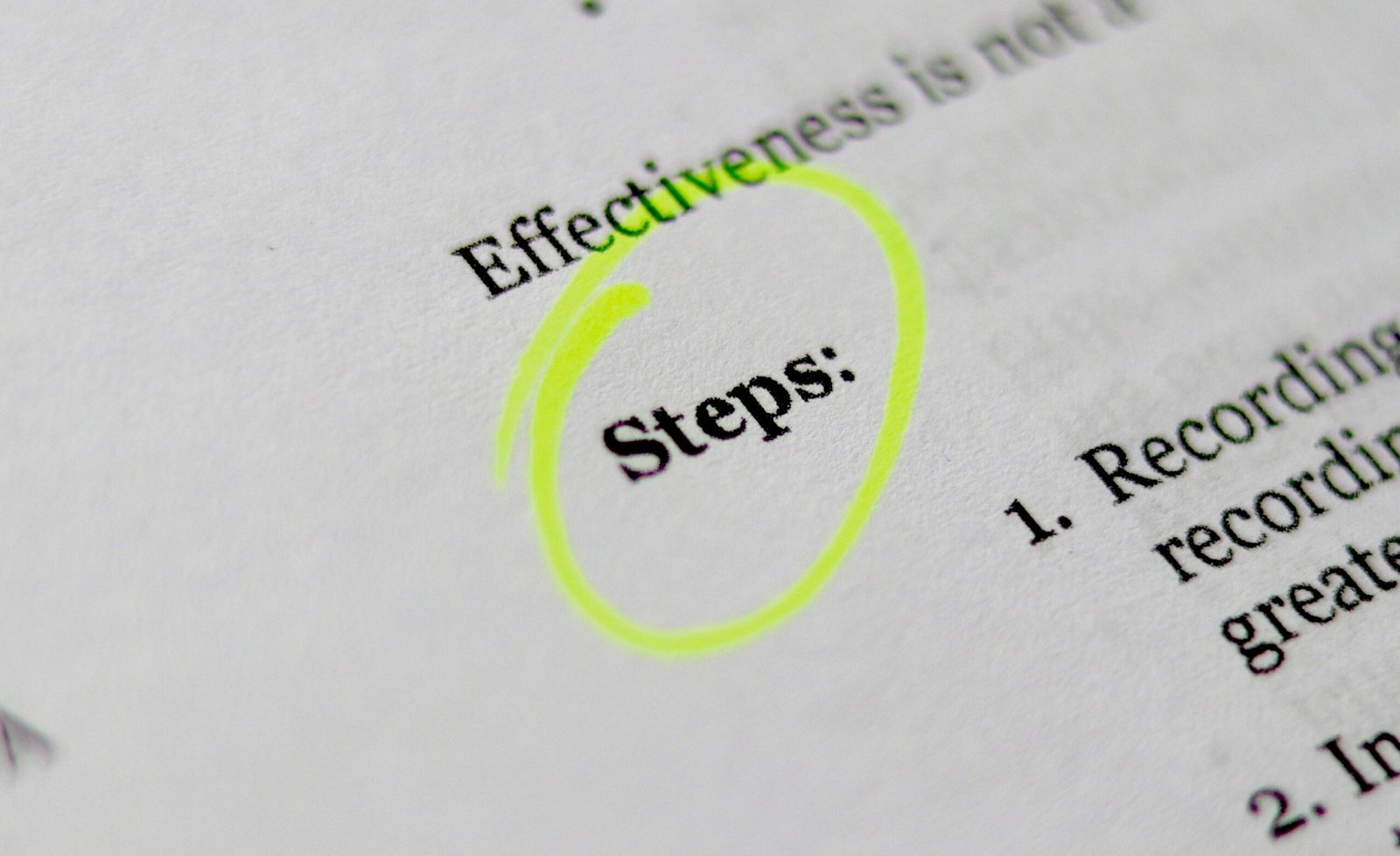 The word steps written in a book and circled in yellow highlight