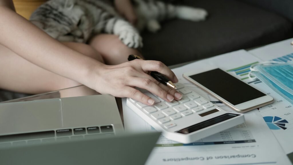 Woman calculating ISA Interest rates