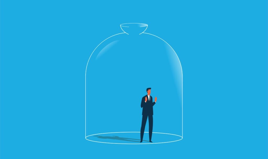 man in a glass cage showing he is trapped