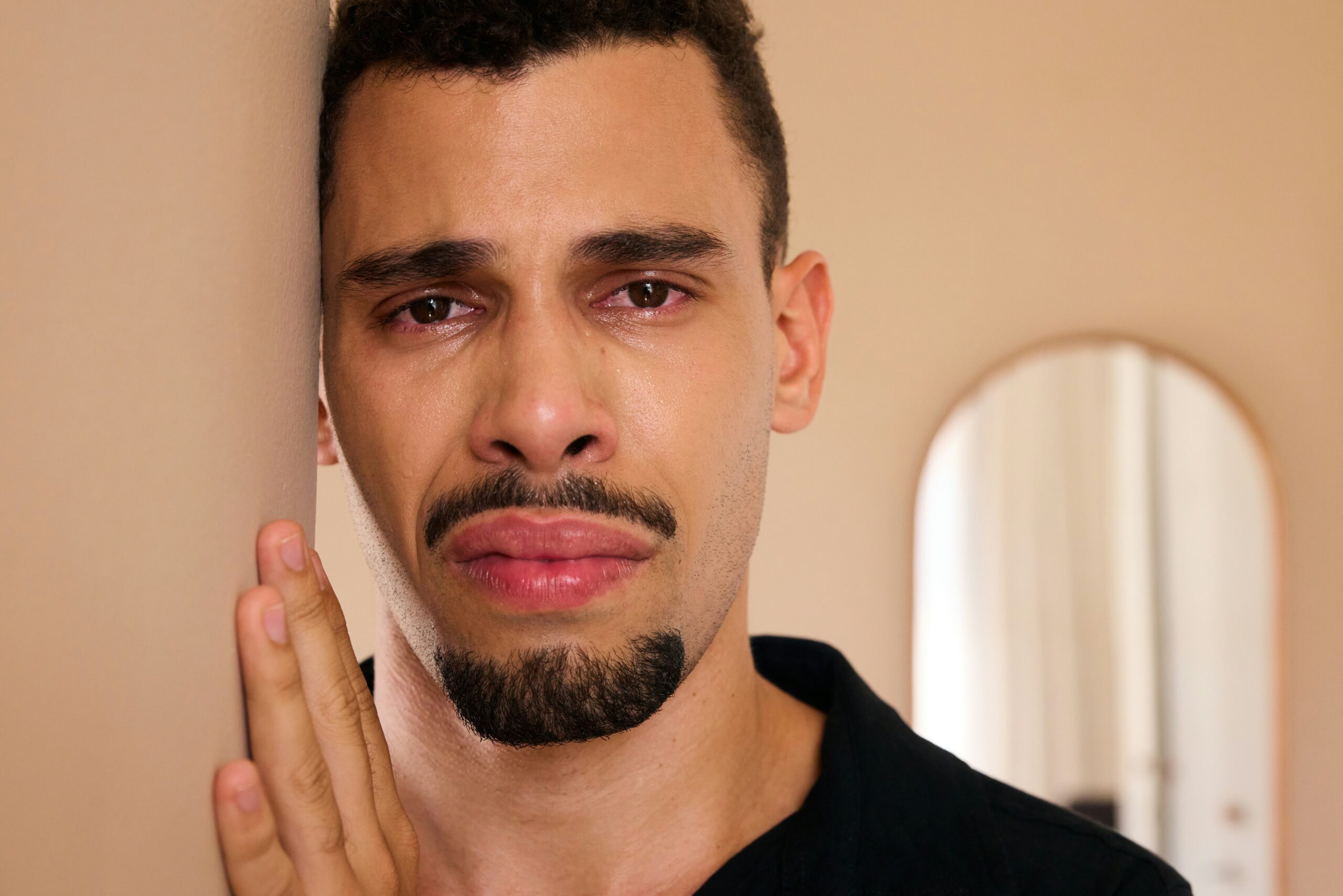 Sad mixed race man